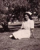 Monica in nurse's uniform